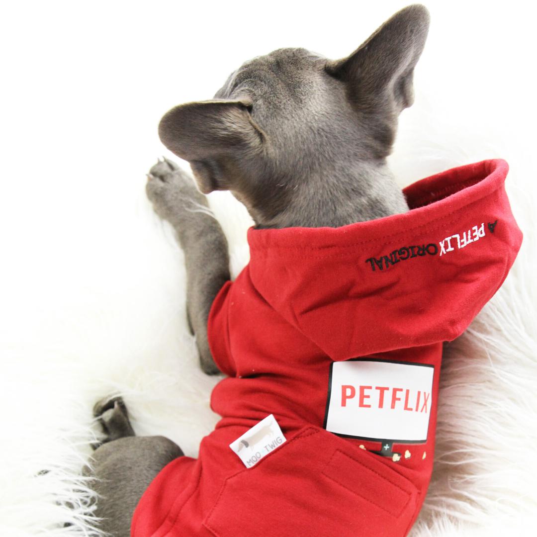 Dog wearing red dog hoodie with Petflix Text - Red Netflix Original Dog Hoodie