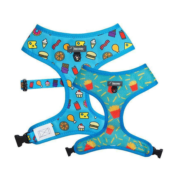 Blue reversible dog harness with junk food and french fries.